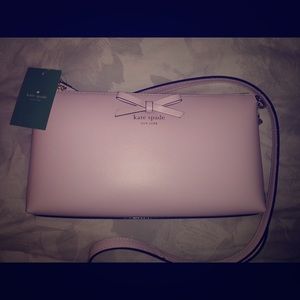 Light pink/lavender Kate Spade purse with strap
